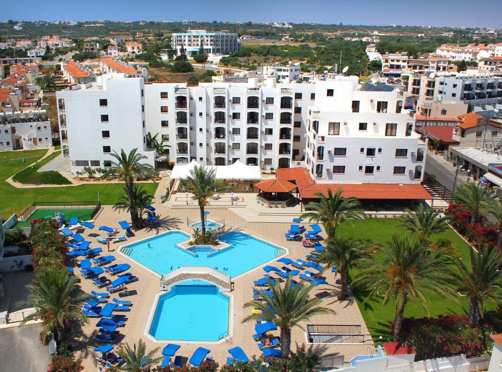an aerial view of a resort with a swimming pool at Seagull Hotel Apartments in Protaras