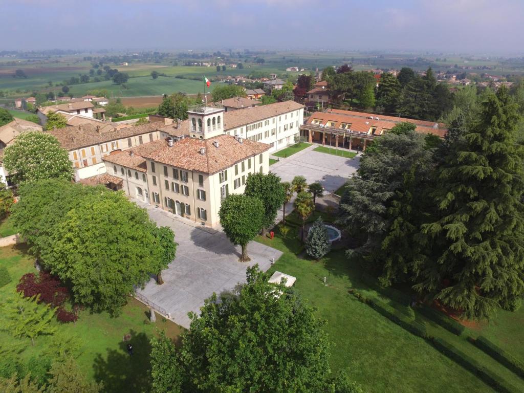 an aerial view of a large building with trees at Villa Lomellini in Montebello della Battaglia
