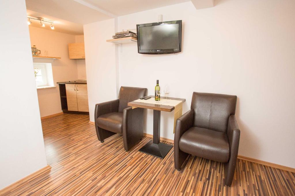 Kuchyň nebo kuchyňský kout v ubytování Apartmán Harrachov se zahradou