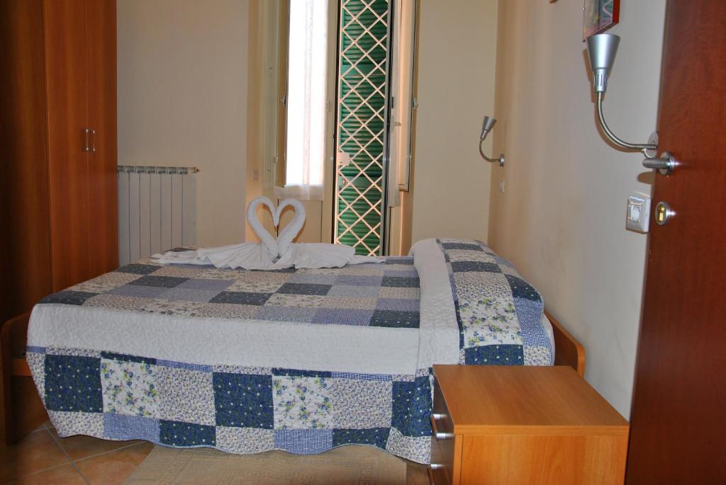 Cama o camas de una habitación en Casa per Ferie Beato Rosaz