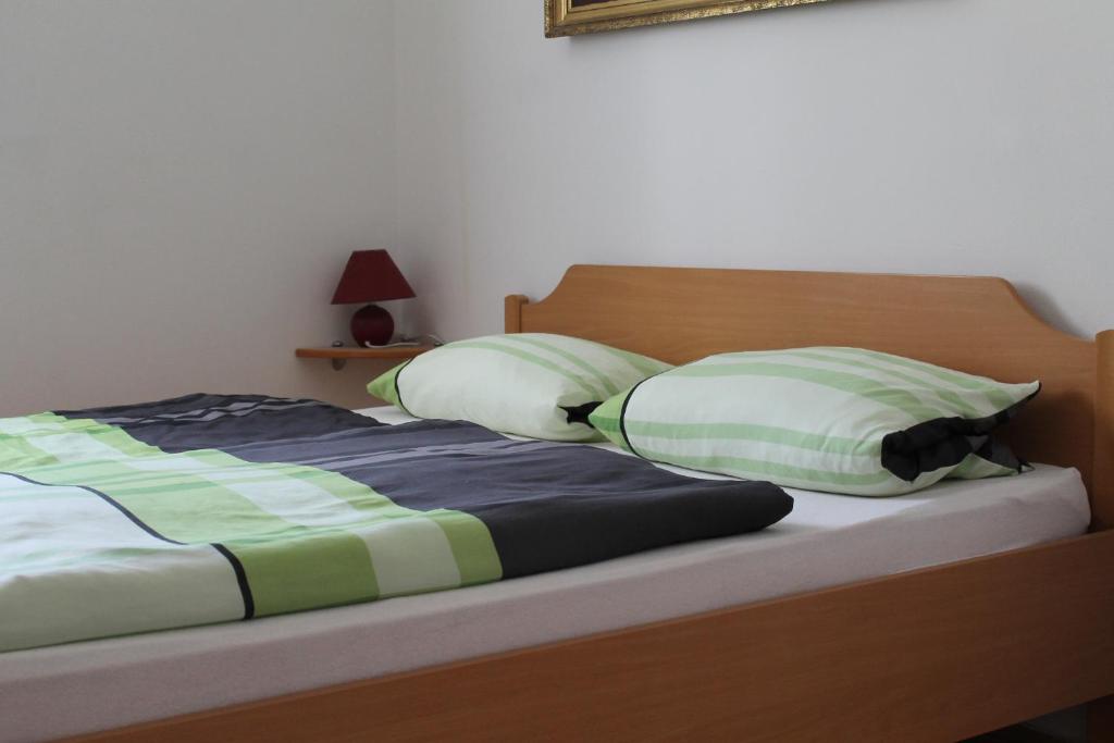 Postel nebo postele na pokoji v ubytování Apartmenthaus Fa