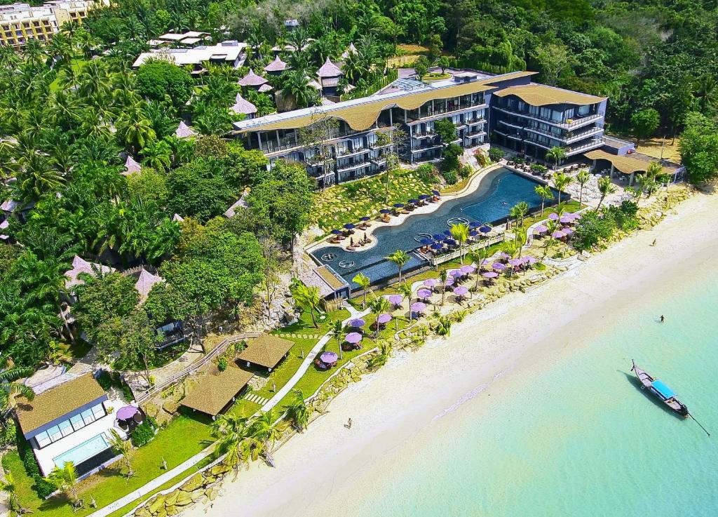 an aerial view of a resort on a beach at Beyond Krabi in Klong Muang Beach