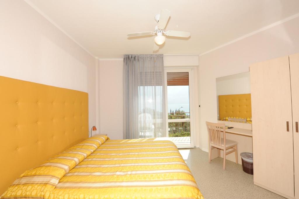 Postel nebo postele na pokoji v ubytování Hotel Villa Grazia