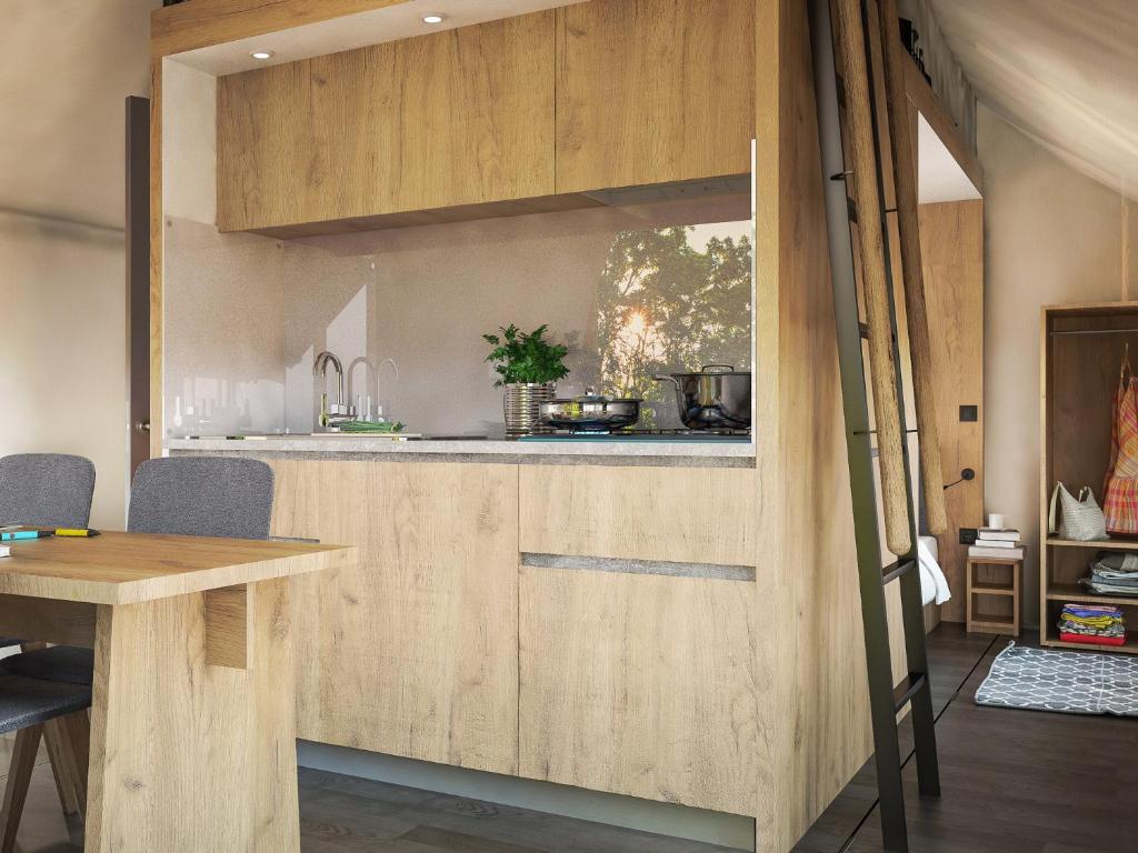 Kuchyň nebo kuchyňský kout v ubytování Glamping Olimia Adria village