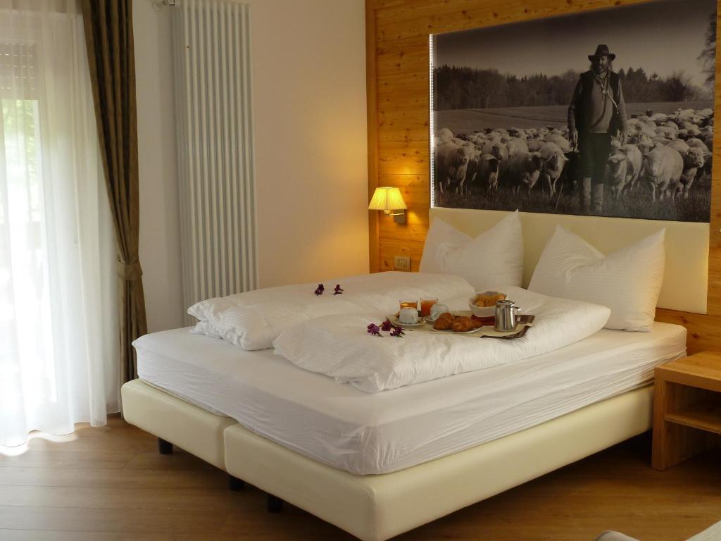 Postel nebo postele na pokoji v ubytování Hotel Pineta