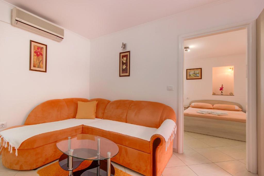 Posteľ alebo postele v izbe v ubytovaní Apartments Leila