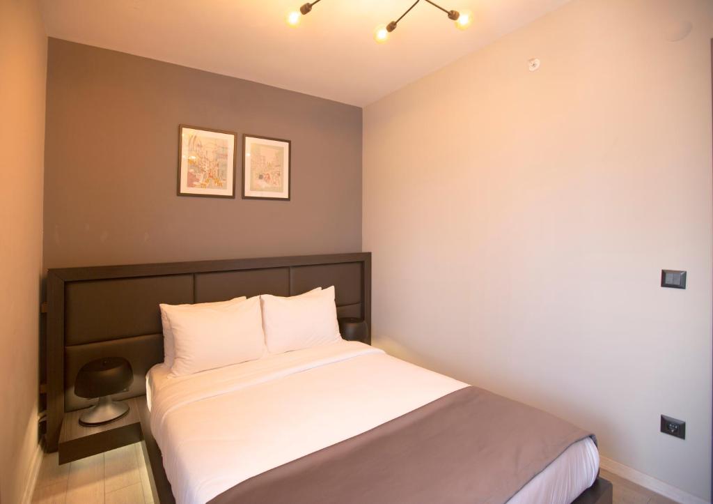 A bed or beds in a room at Cityloft 36