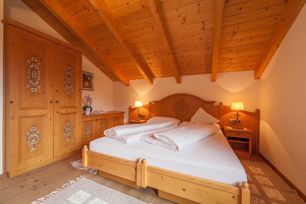 Postel nebo postele na pokoji v ubytování Hotel Hubertushof