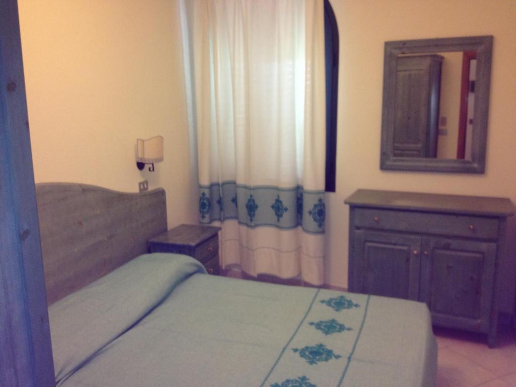 Postel nebo postele na pokoji v ubytování Residence Marina Palace