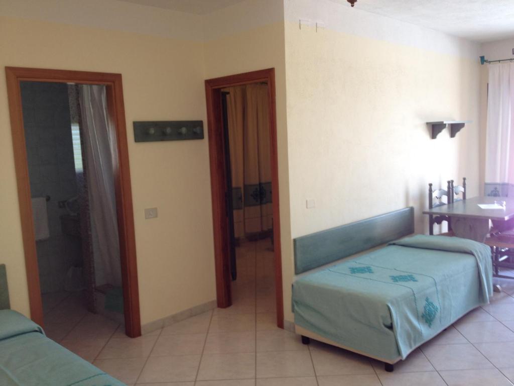 Postel nebo postele na pokoji v ubytování Residence Marina Palace