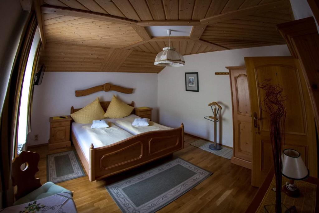 Postel nebo postele na pokoji v ubytování Weingut Stoff