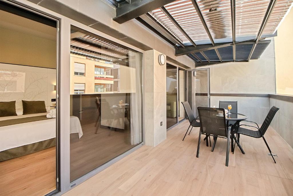 Posedenie v ubytovaní Apartamentos Suites Oficentro Deluxe