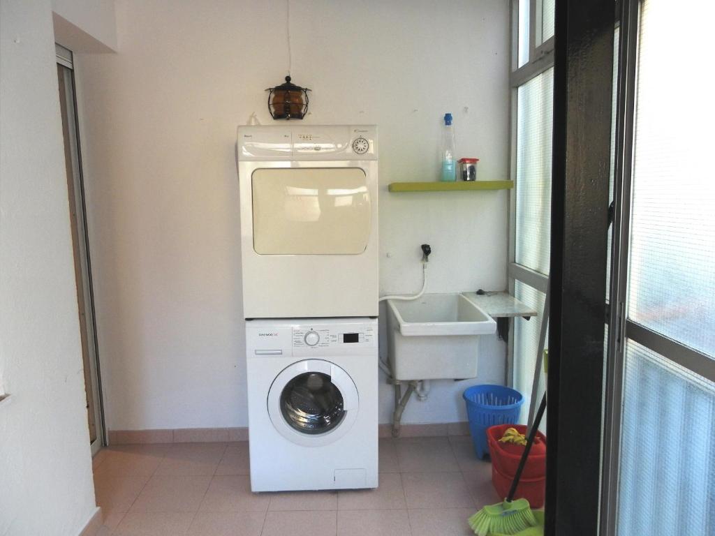 A kitchen or kitchenette at Apartament Margarit