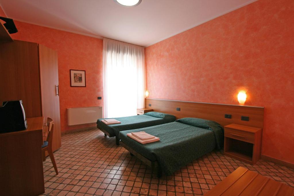 Postel nebo postele na pokoji v ubytování Da Mariuccia