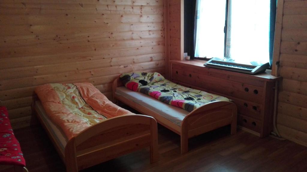 Posteľ alebo postele v izbe v ubytovaní Agroturystyka pod Pstragiem