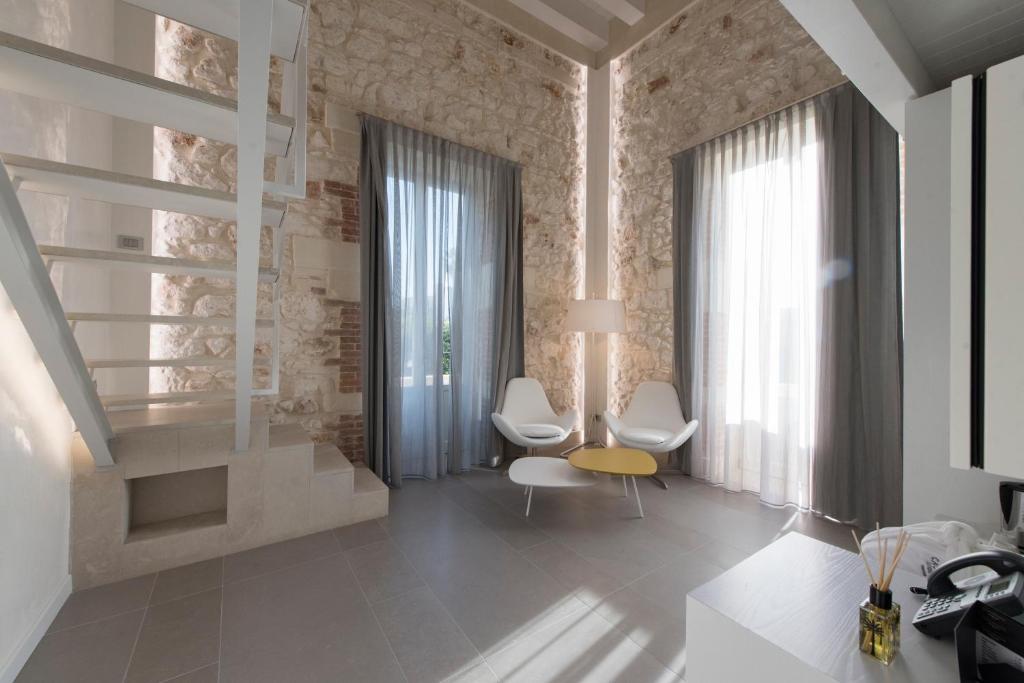 Posezení v ubytování Caportigia Boutique Hotel