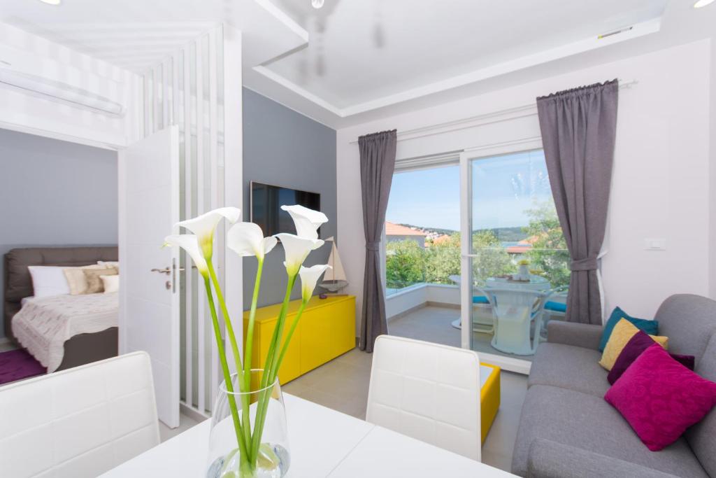 Televízia a/alebo spoločenská miestnosť v ubytovaní Apartments Soho