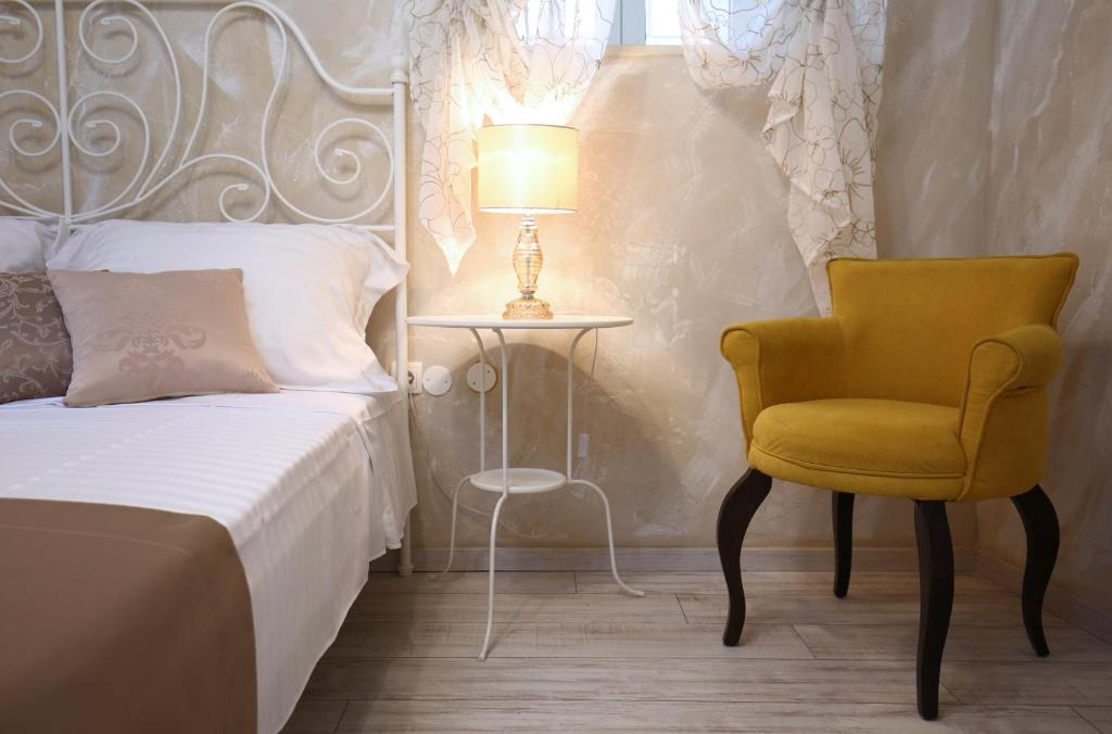 Postel nebo postele na pokoji v ubytování Luxury Lidija Rooms