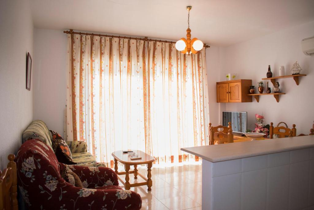 Posedenie v ubytovaní Apartamentos Carmina