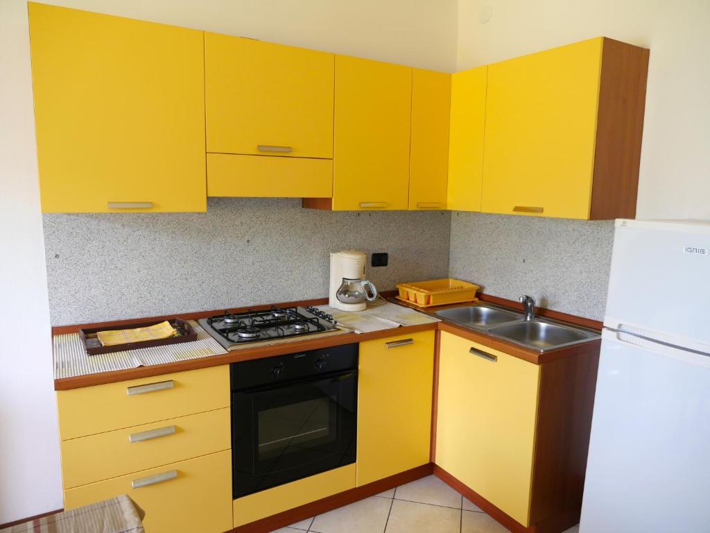 Kuchyň nebo kuchyňský kout v ubytování Residence Leggeri
