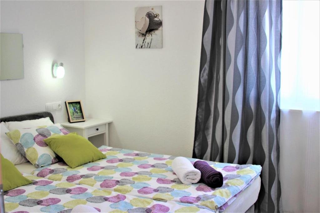 Posteľ alebo postele v izbe v ubytovaní Apartments Medvid