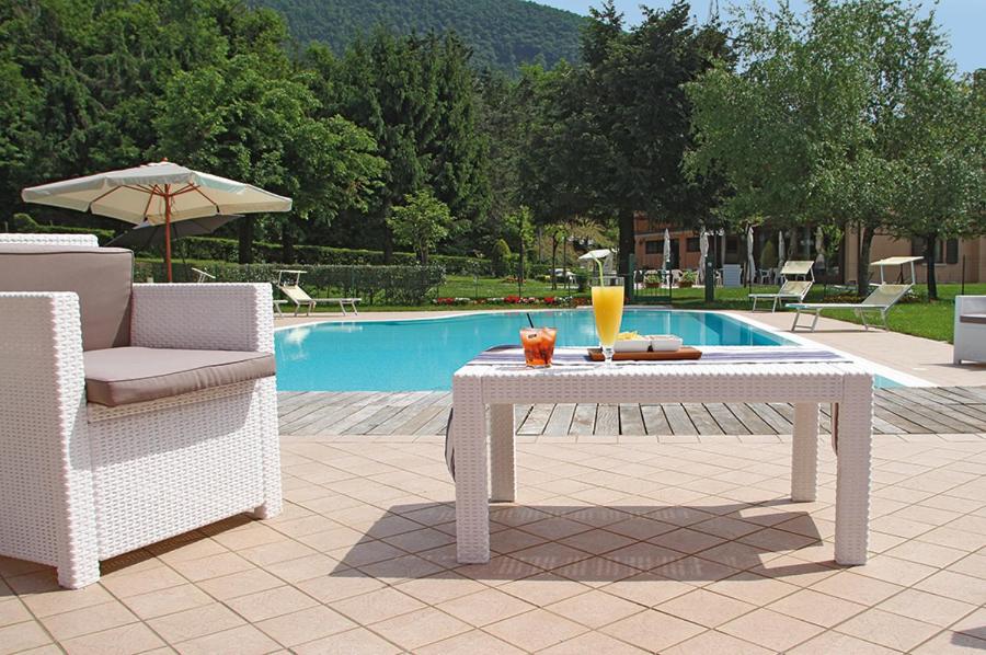 Bazén v ubytování Hotel Colomber nebo v jeho okolí
