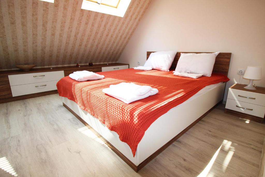 Postel nebo postele na pokoji v ubytování Lilly Apartments