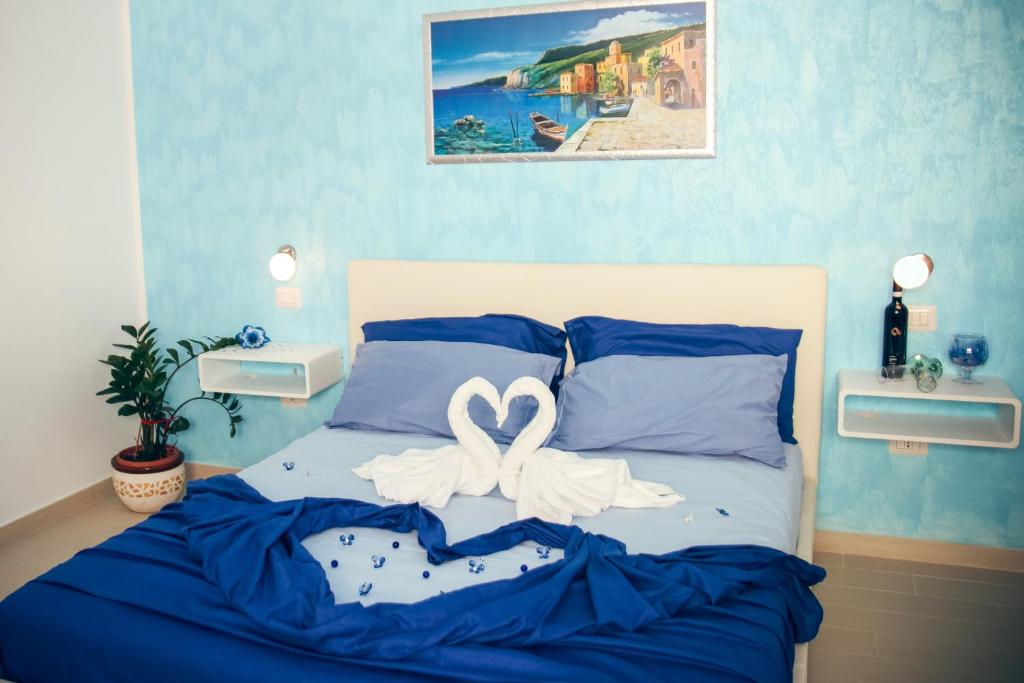 Postel nebo postele na pokoji v ubytování Il Sorriso B&B