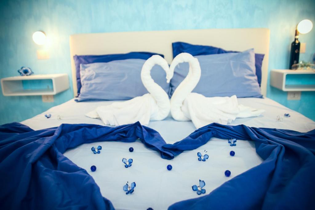 Postel nebo postele na pokoji v ubytování Il Sorriso B&B