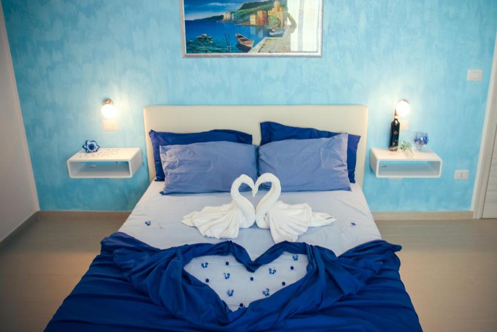 Postel nebo postele na pokoji v ubytování Il Sorriso B&B