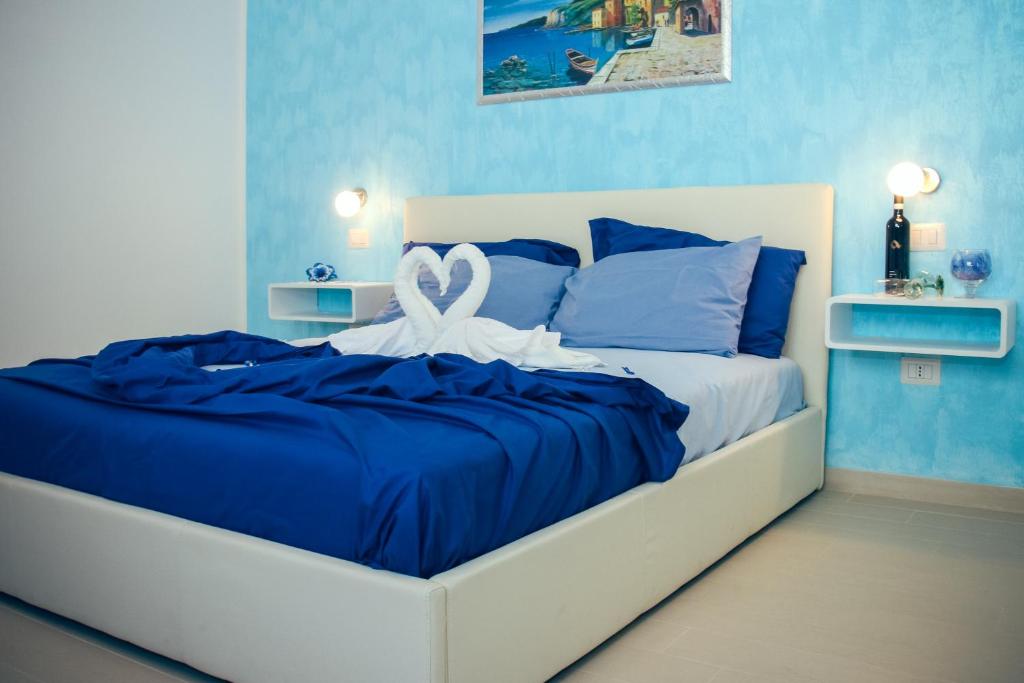 Postel nebo postele na pokoji v ubytování Il Sorriso B&B