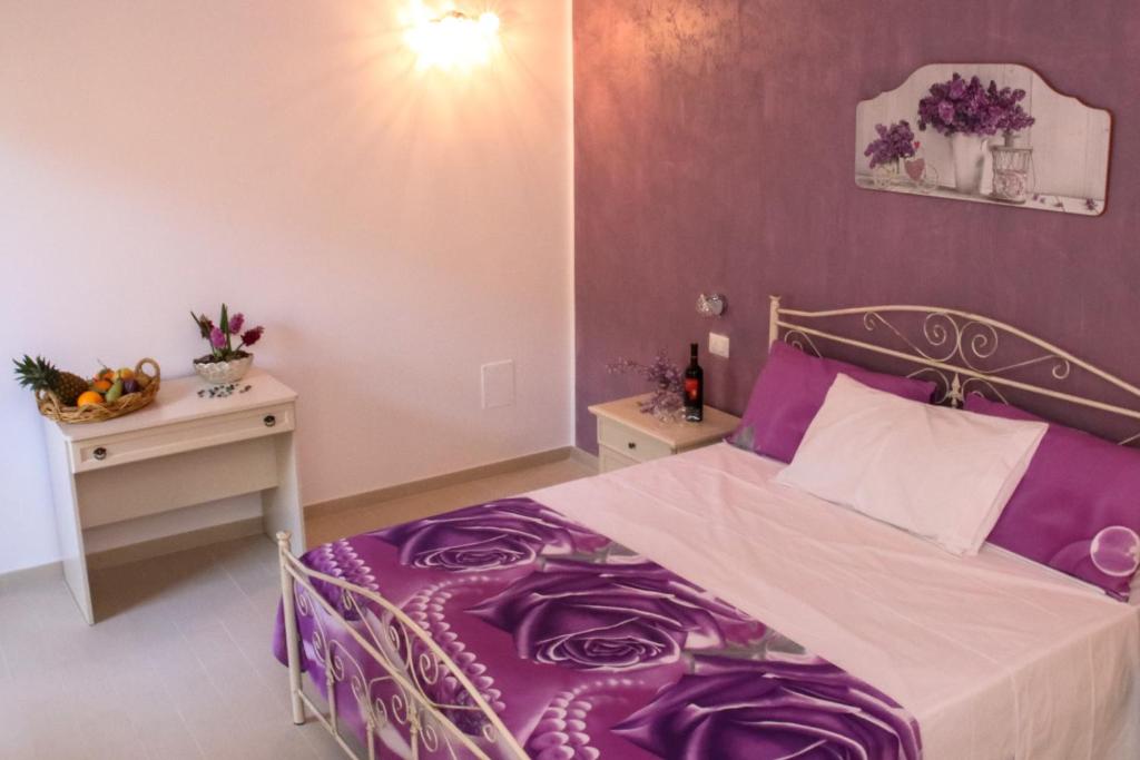 Postel nebo postele na pokoji v ubytování Il Sorriso B&B