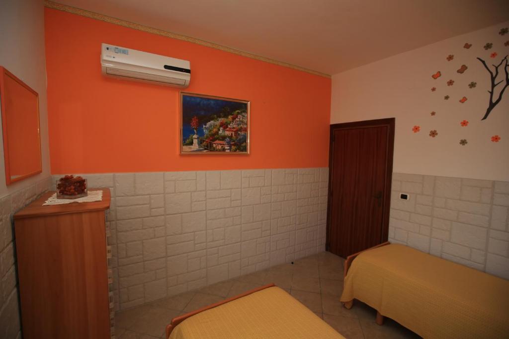 Postel nebo postele na pokoji v ubytování Casa Fusco