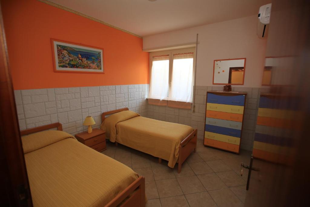 Postel nebo postele na pokoji v ubytování Casa Fusco