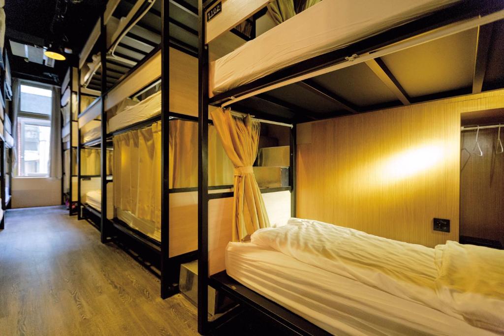 Postel nebo postele na pokoji v ubytování Angels Hostel Taipei Ximen