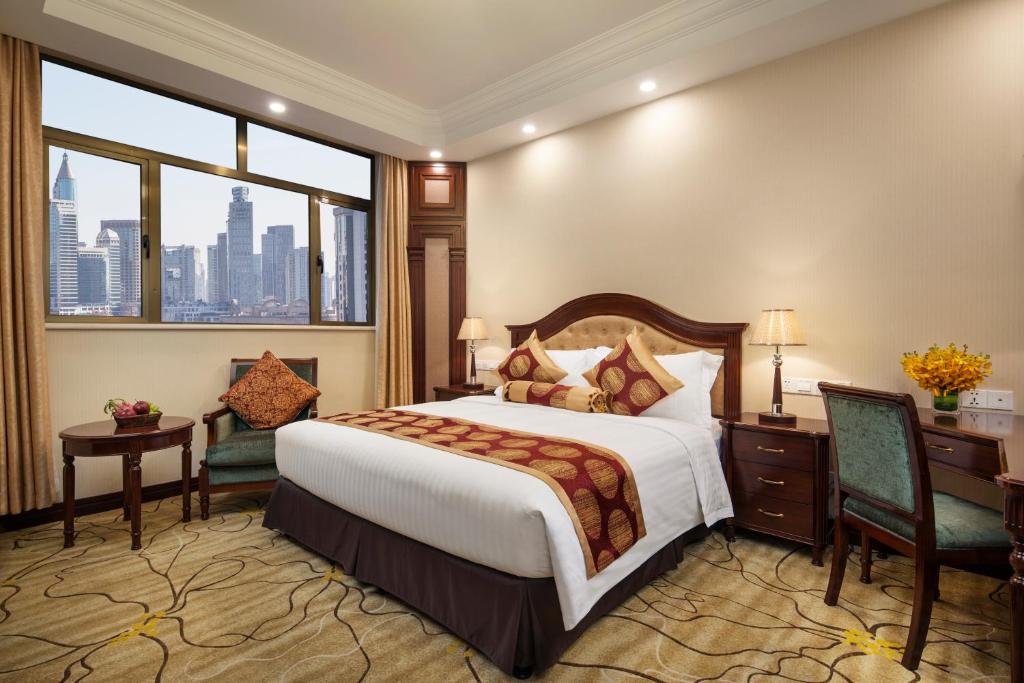Katil atau katil-katil dalam bilik di Jin Jiang Pacific Hotel