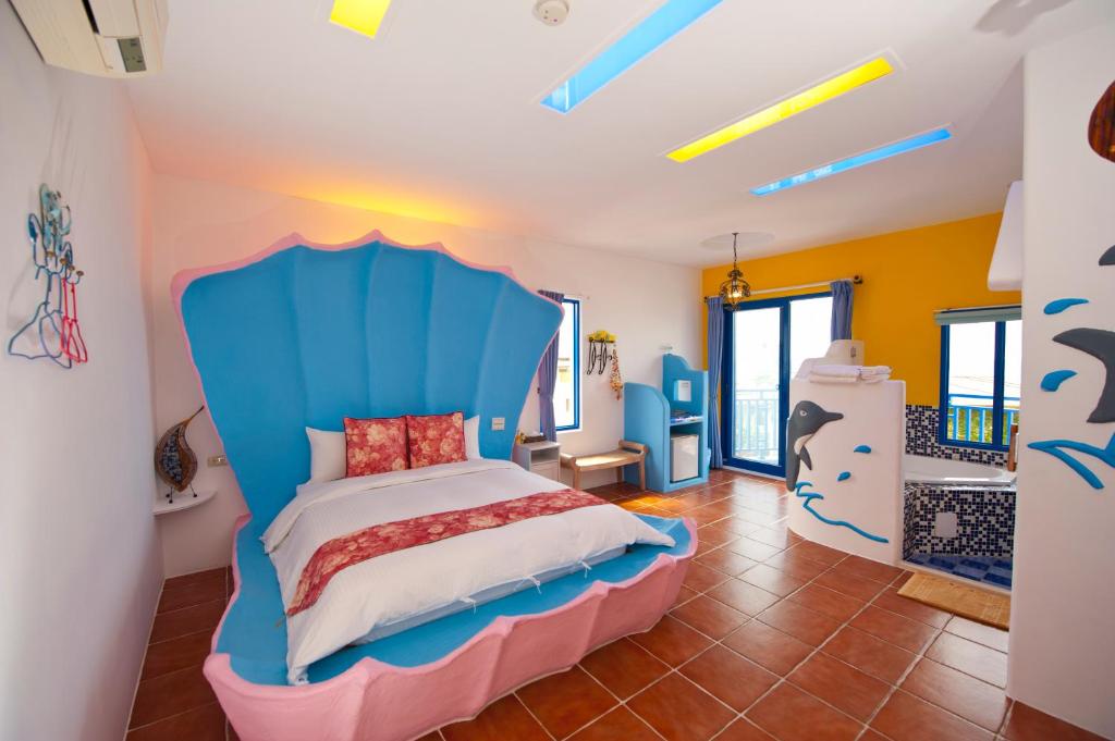Postel nebo postele na pokoji v ubytování Haisu Homestay