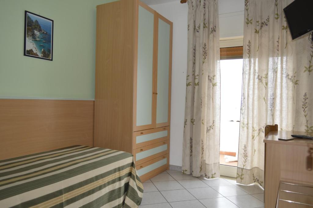 Postel nebo postele na pokoji v ubytování Hotel Zilema