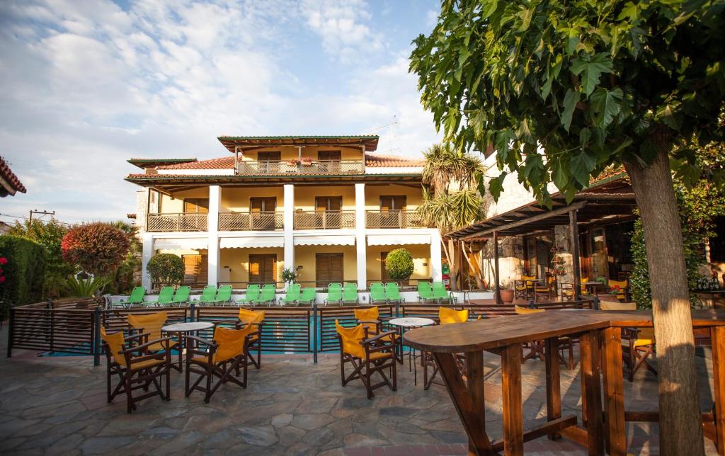 Reštaurácia alebo iné gastronomické zariadenie v ubytovaní Ammon Garden Hotel