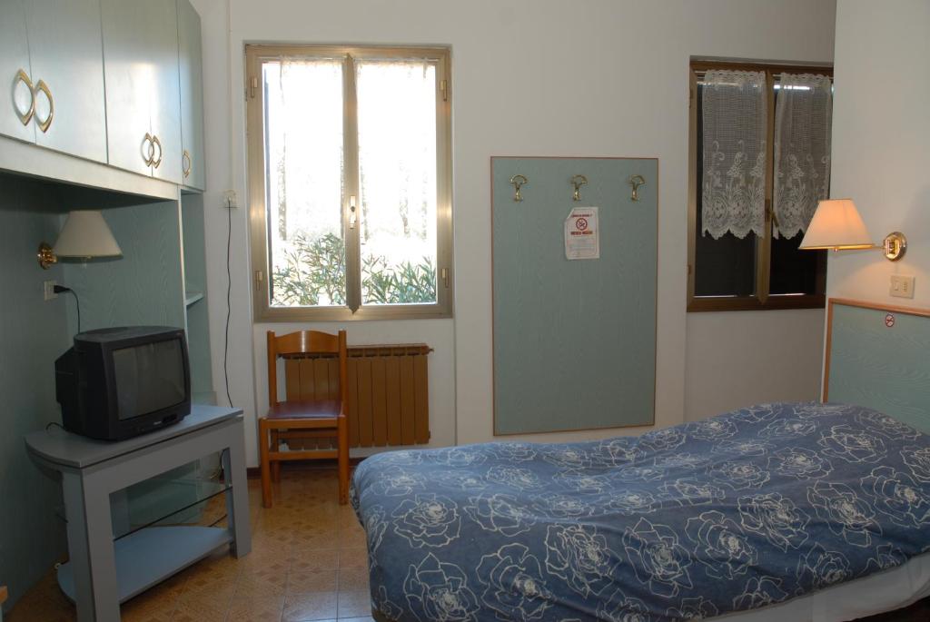 Voodi või voodid majutusasutuse Hotel "Locanda Gaia" toas