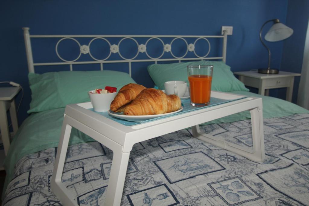 Postel nebo postele na pokoji v ubytování Cala Chiara B&B