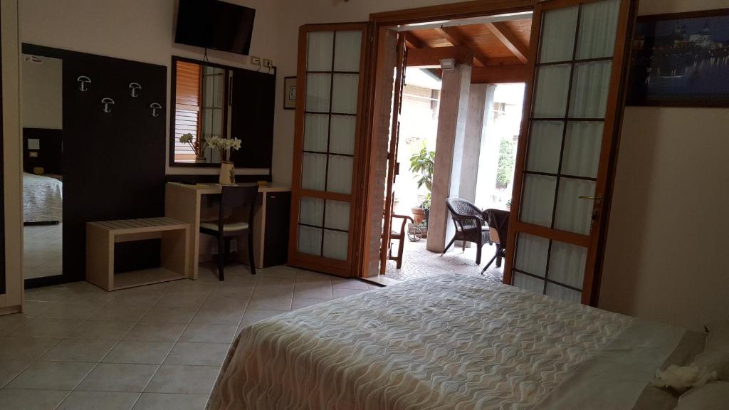 TV a/nebo společenská místnost v ubytování B&B ENSILEVA BEACH