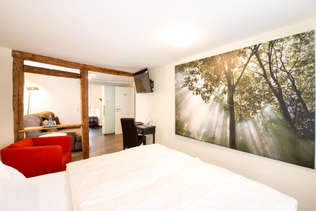 Postel nebo postele na pokoji v ubytování Flair Hotel Hopfengarten