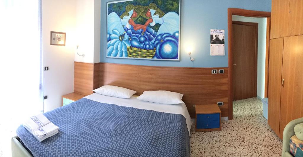 Łóżko lub łóżka w pokoju w obiekcie Piccolo Principe Salerno B&B