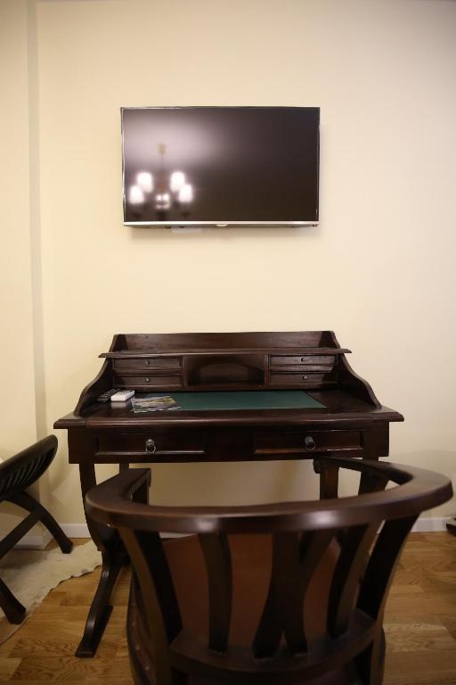 TV a/nebo společenská místnost v ubytování La-La Rooms