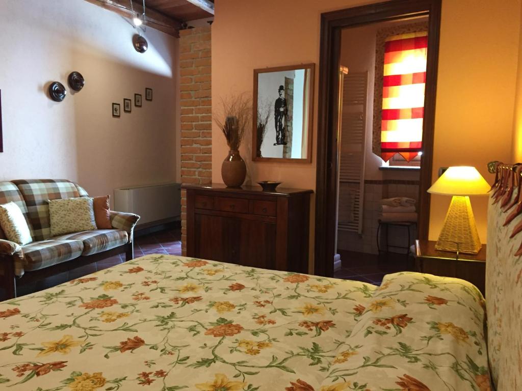 Postel nebo postele na pokoji v ubytování Cascina Baresane