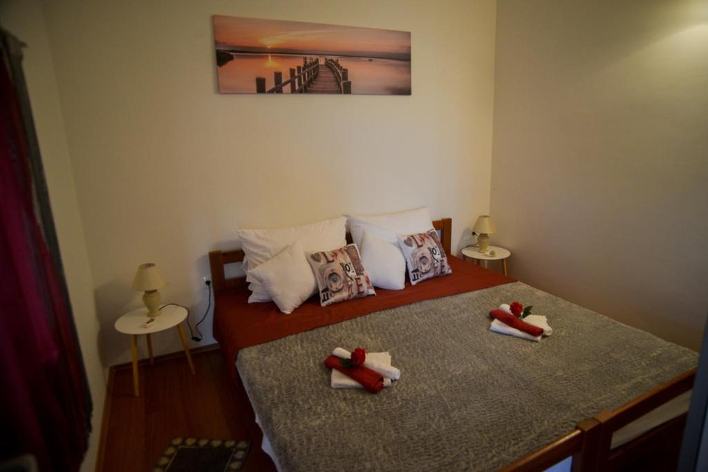 Postel nebo postele na pokoji v ubytování Apartment Antonio