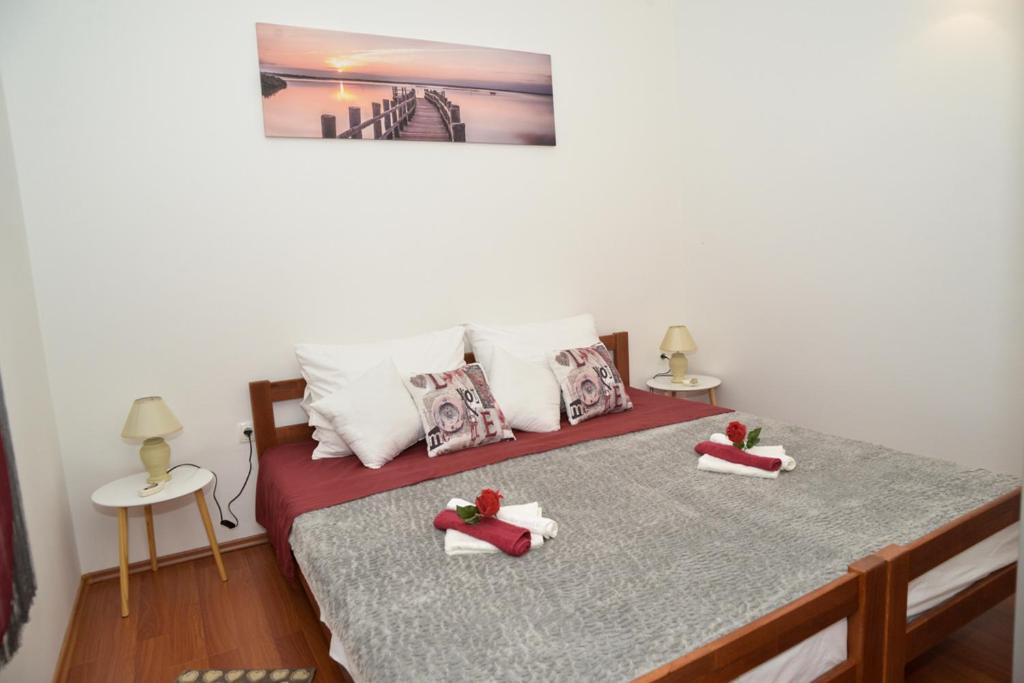 Postel nebo postele na pokoji v ubytování Apartment Antonio