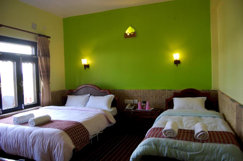 Postel nebo postele na pokoji v ubytování Sweet Home