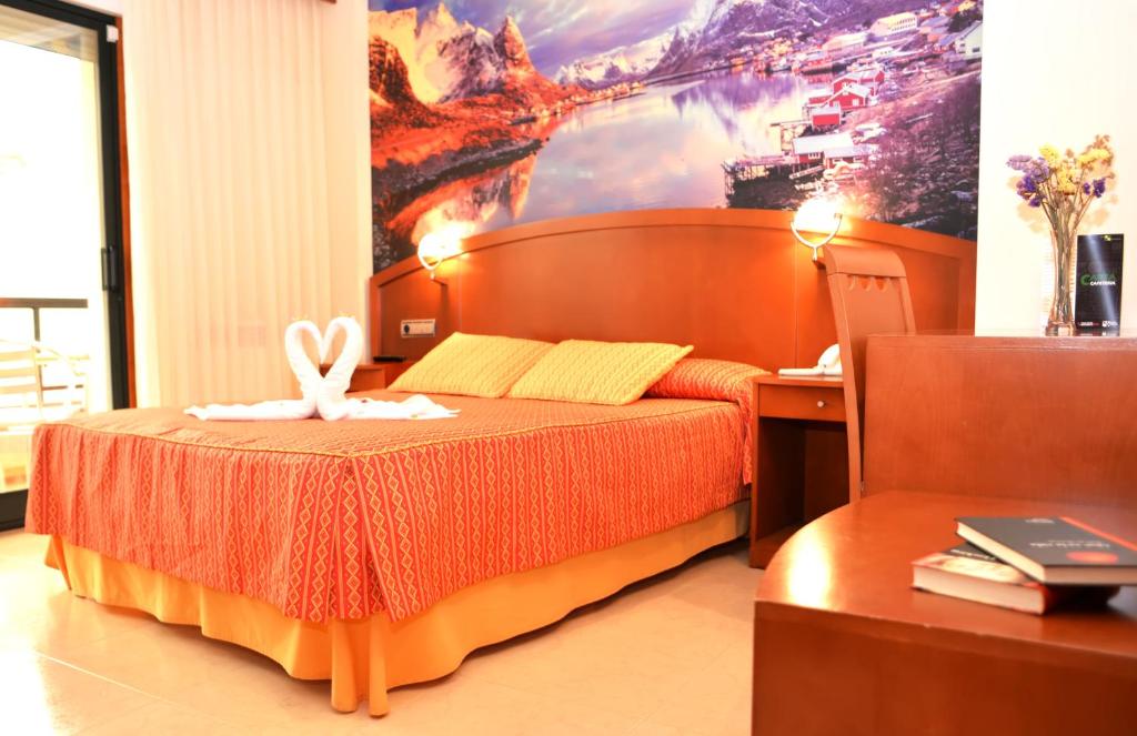 Postel nebo postele na pokoji v ubytování Hotel Portonovo